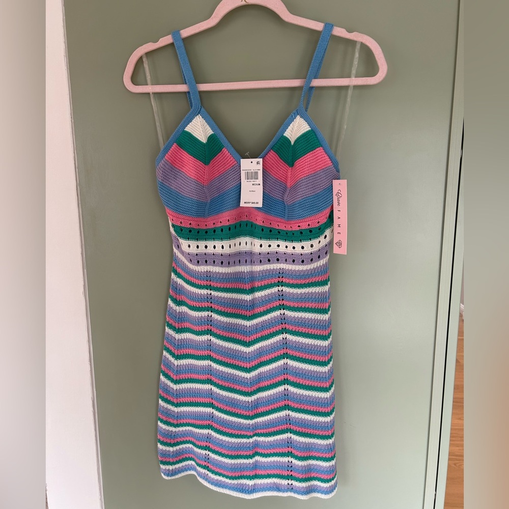 Crotchet like multicolor mini dress. Tight fitting medium
